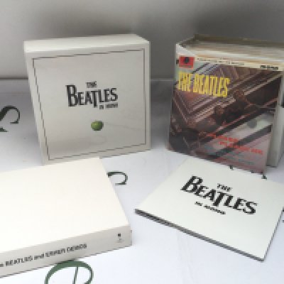 A Beatles In Mono CD box set and a Beatles White Album CD set (2).