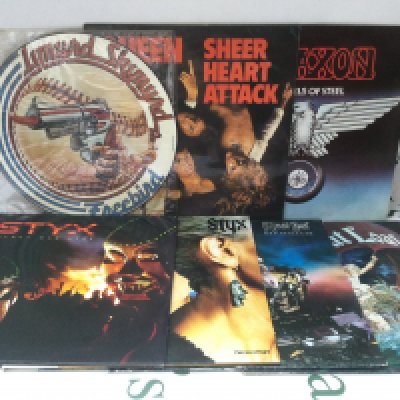 Thirteen rock LPs and a 12" picture disc single by various artists including Queen, Styx and others.