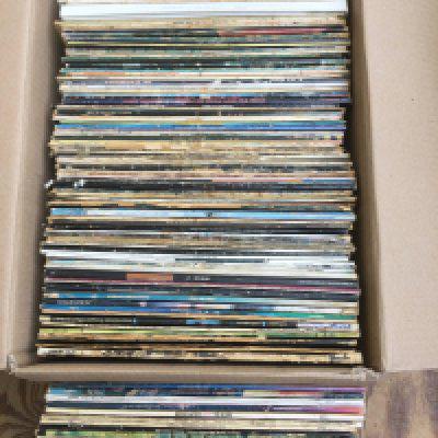 A box and a bag of LPs and 12" singles by various artists including Pink Floyd, The Rolling Stones, REM and many more.