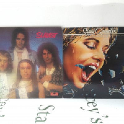 Two signed LPs comprising Sladest signed by Noddy Holder and Don Powell and a Greatest Hits compilation signed by Suzi Quattro.