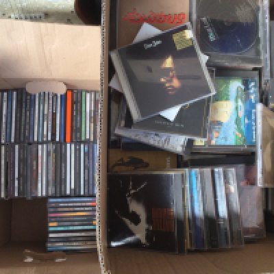 Two boxes of CDs by various artists including Prince, Bob Marley, Led Zeppelin and many more.