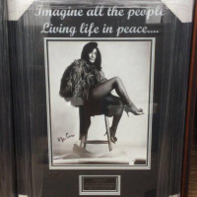 A framed and glazed signed Yoko Ono display with COA, approx 68.5cm x 46.5cm.