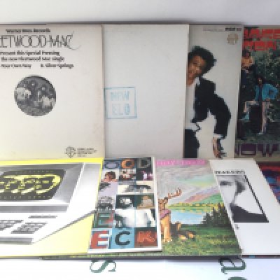Eighteen rock and pop LPs and 12" singles by various artists including three promo discs by David Bowie, Fleetwood Mac and ELO plus others.