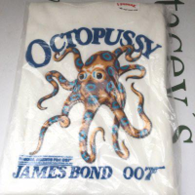 An original unworn 1983 James Bond Octopussy Moneypenny Ltd 'Squeak' T shirt, size L.