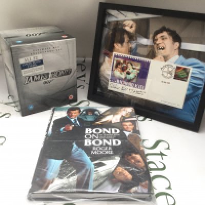 A limited edition Bond On Bond book signed by Roger Moore together with a Richard Kiel signed 'Jaws' 007 ltd ed stamp cover and a James Bond 22DVD box set (3).