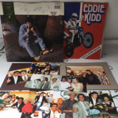 An Eddie Kidd signed 12" single, souvenir brochure and various photographs.