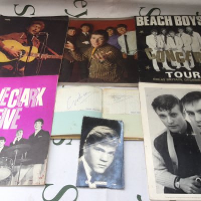 A small collection of 1960s autographs and music programs comprising the signatures of Graham Nash, Tony Hicks, Jet Harris and Tony Meehan.