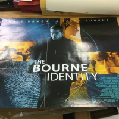 Twenty two film posters comprising eight Matrix film posters, Sleepy Hollow, Sin City, Bourne Identity and others.