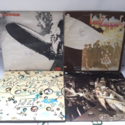 Four Led Zeppelin LPs including red/plum Atlantic labels comprising Led Zeppelin 1,2 and 3 plus In Through The Out Door. Led Zep 3 has one feelable scratch. Sleeve issues.