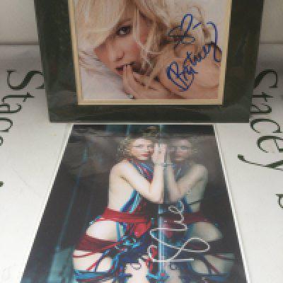 A signed photo of Britney Spears and one of Kylie Minogue, both with COAs.
