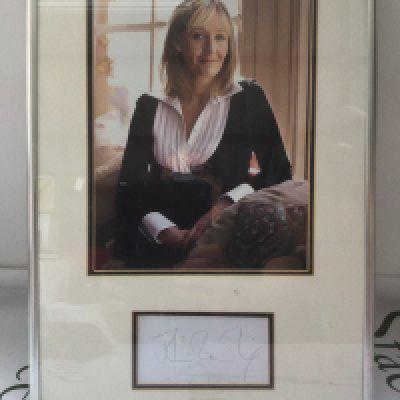 A framed and glazed signed photo display of JK Rowling with COA, approx 31cm x 41cm.
