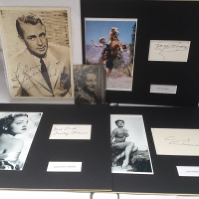 Five autographs comprising Roy Rogers, Gracie Fields, Alan Ladd, Dorothy Lamour and Cyd Charisse.
