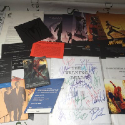 A collection of film memorabilia including a signed Walking Dead script, lobby cards, film premiere tickets etc