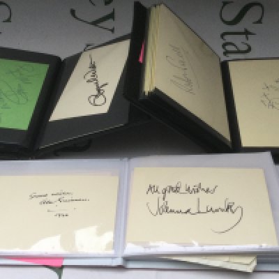 Three autograph booklets containing many signatures including Alec Guiness, Joan Collins, Robert Redford, Donald Sutherland, Debbie Reynolds, Racquel Welch and many more. Please see images for a more detailed list.