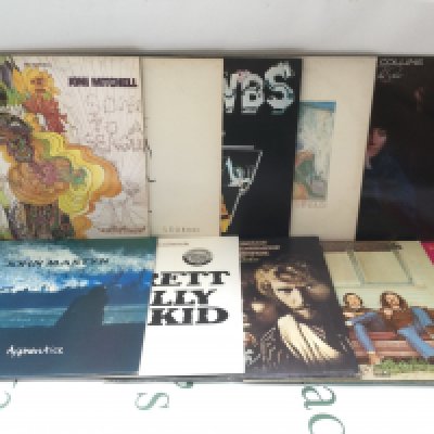 Two bags containing 20 folk rock LPs by various artists including John Martyn, Joni Mitchell, Judy Collins and others.