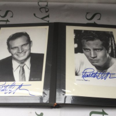 Four binders of signed photos comprising Bette Davis, Doris Day, John Hurt, George Burns, Michael Caine and others. See images for lists of contents.
