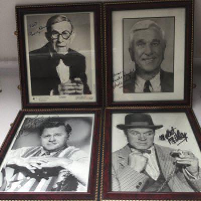 Four framed and signed photos comprising George Burns, Bob Hope, Mickey Rooney and Leslie Nielsen.