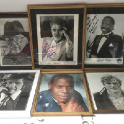 Six framed and signed photos of Robert Redford, Rod Steiger, Steve Martin and others.