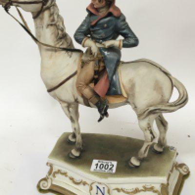 A Capodimonte ceramic figure of Napoleon mounted on his horse. No obvious damage height 34cm