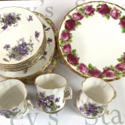 A Royal Albert Old English Rose pattern cake stand and serving plates together with a Hammersley 6 setting Victorian Violets pattern. Teaset (D)