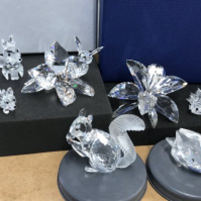Three Swarovski flower pieces- boxed together with Swarovski squirrel, hedgehogs, swans various