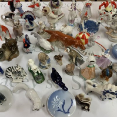 A large and extensive collection of USSR and Lomonosov porcelain figurines. Approx 100 figures (D)