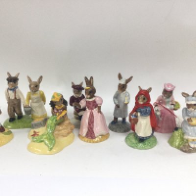 A collection of porcelain Bunnykins figures including Mermaid Bunnykins, Little Bo Peep, Little Boy Blue Bunnykins. This lot cannot be posted