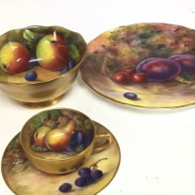 A quality hand painted Worcester dish with fruit by E Townsend a small cup and saucer by T Lockyer a Worster dish and two jugs no obvious damage.