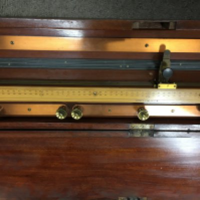 WITHDRAWN - A Mahogany cased slide wire potentiometer maker Elliott brothers .