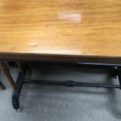 A Victorian mahogany table the rectangle top above turned supports .