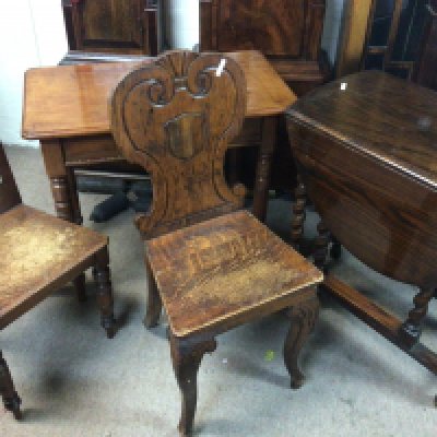 An oak drop leaf dining table an Edwardian walnut table with a single drawer and and two oak Victorian hall chairs (4)