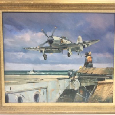 An oil painting of a sea fury plane titled Cut by Anthony Cowland, dimensions 68x58cm. This lot cannot be posted