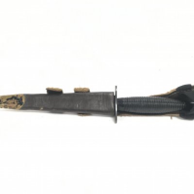A Fairbairn Sykes fighting knife, third pattern made by William Rodgers, Sheffield. Blade 18cm long , 30cm long total length. This lot cannot be posted