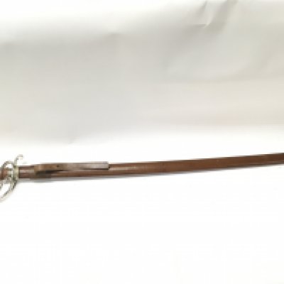 A Royal Artillery Officers sword by Wilkinson with a leather scabbard , 110cm total length. This lot cannot be posted
