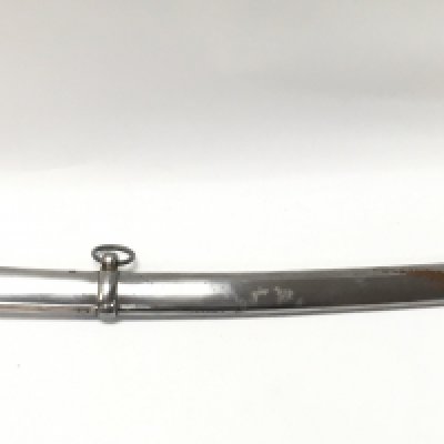 A reproduction 19th century cavalry sword with a chrome scabbard, brass hilt and a black leather grip. Blade 86cm. Total length 110cm. This lot cannot be posted