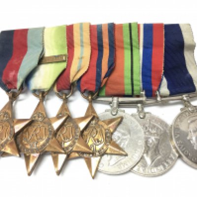 A Collection of British WW2 medals including stars 1939-1945, Atlantic with a France And Germany bar, Africa, Burma, defence and victory medals, Long service medal presented to MX.57334 G.Edwards. C.E.R.A H.M.S DOLPHIN. Postage category A