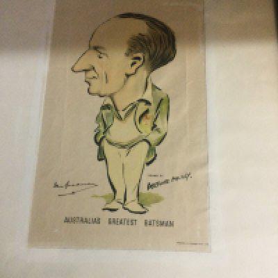 A framed letter signed by Don Bradman , together with score card And spy print .