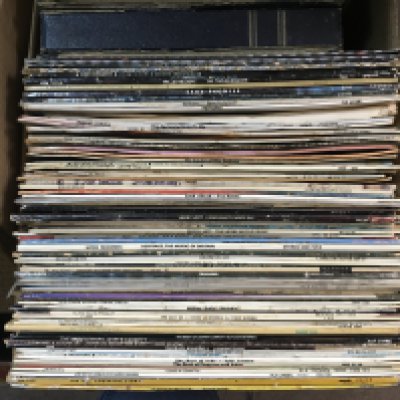 Three boxes and a record case of LPs y various artists including ABBA, Bob Dylan and others plus some film soundtracks (4).