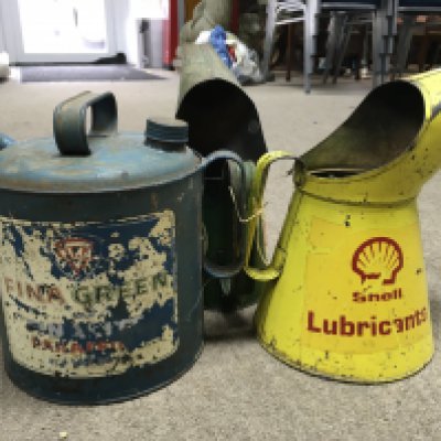 A vintage Castrol and Shell oil jugs and fina paraffin can. Tallest can 27cm