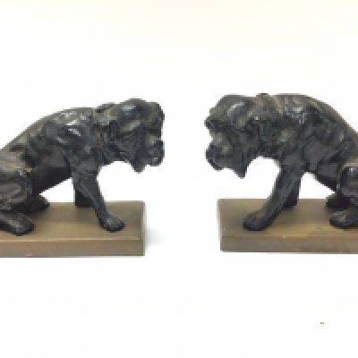 A pair of cast iron French dog figures, approximately 10cm tall. Postage category B