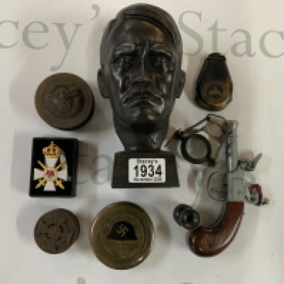 A small collection of German replica militaria including a small bust of Adolf Hitler