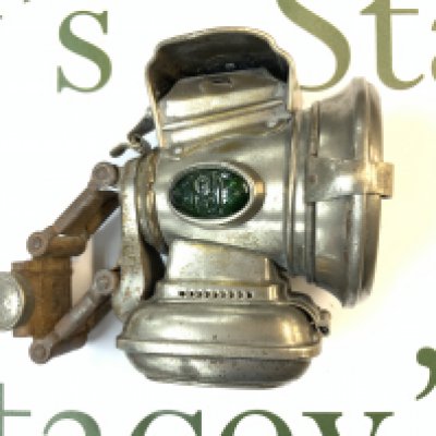 A vintage P & H "New Horoscope" front oil lamp for bicycles. (B)