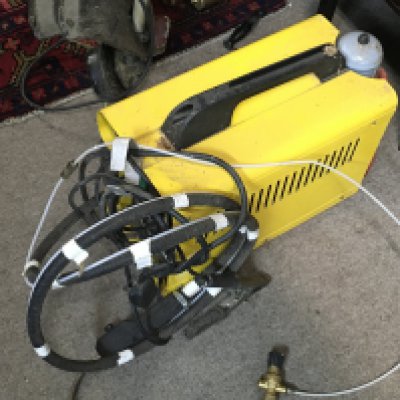 A monomig sureweld and Ryobi electric strimmer.