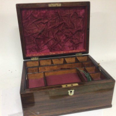 A quality late Victorian Rosewood jewellery box with a well fitted interior the side with a sprung drawer with keys and mother of pearl escutcheon. 30x23cm