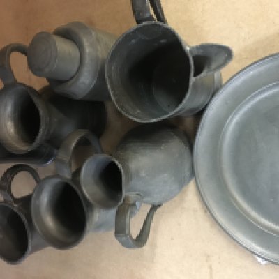 A Collection of pewter including tankards an tea caddy.