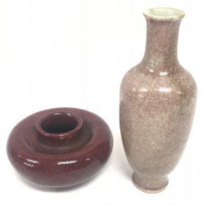 A Chinese glazed vase and a Sang De Bouef vase. No obvious damage or restoration. 15 and 5cm tall. This lot cannot be posted
