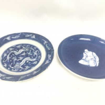 Chinese blue and white dishes including a dragon dish and a Budai Dish. 19 and 21cm wide. This lot cannot be posted