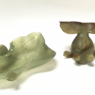 Two carved Chinese jade items, a fish figure and a dish. This lot cannot be posted