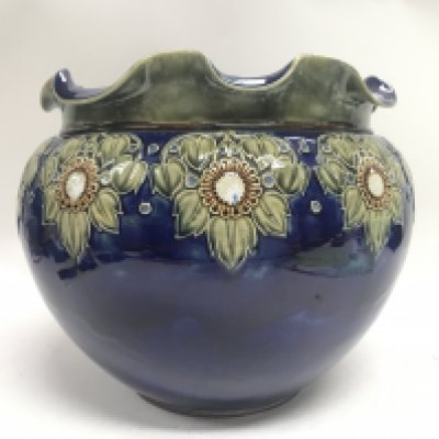 A Royal Doulton Lambeth Stoneware Jardineer, 27cm wide approximately. 22cm tall. This lot cannot be posted