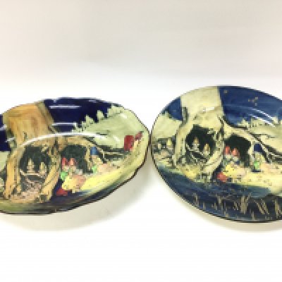 Early 20th century Royal Doulton Charles Noke Pixie tree bowl with damage on base and matching plate, 26 and 28cm wide. This lot cannot be posted